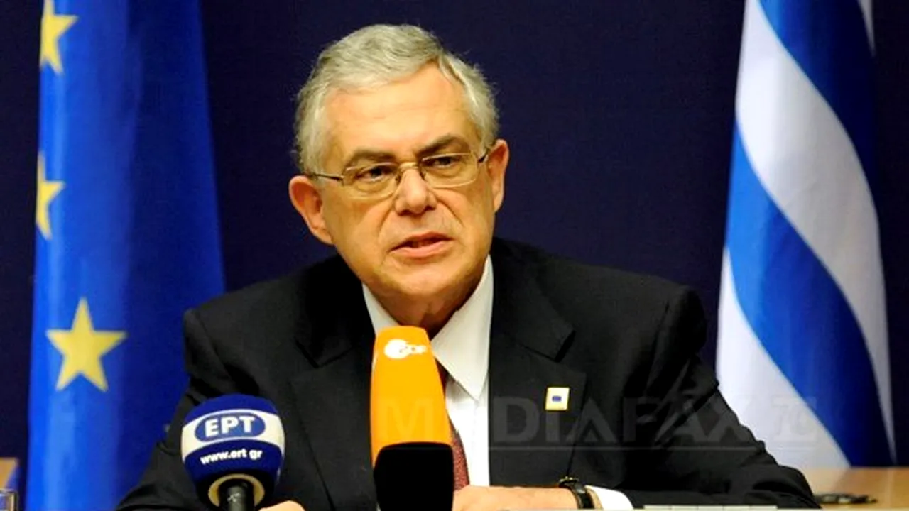Premierul Greciei a cerut Parlamentului de la Atena să voteze între programul de salvare şi haos