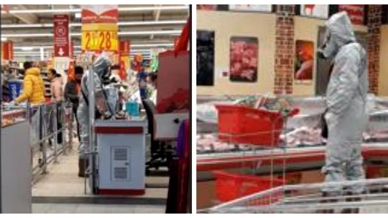 FOTO: Bărbat în costum contra pericolelor chimice, la cumpărături într-un centru comercial din Braşov