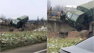 Camion militar, la un pas să cadă de pe un pod la ieşirea din Dej. FOTO