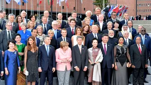 GALERIE FOTO Melania sau Brigitte? Nici vorba! Ea a fost cea mai sexy apariţie de la Summit-ul G20. A atras toate privirile