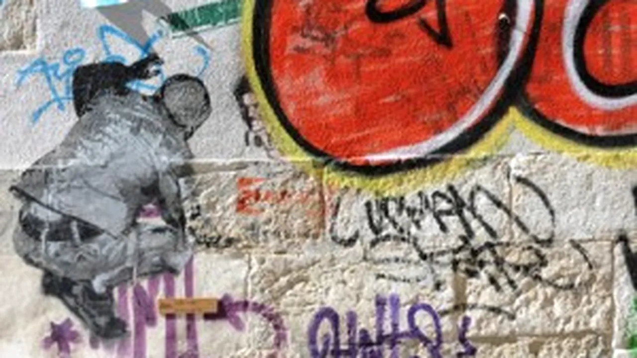 Graffiti Artists Paint Bucharest Police Fence In Violence Prevention Campaign