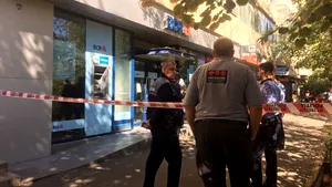 Bărbatul suspectat că a vrut să jefuiască o bancă din Capitală a fost prins