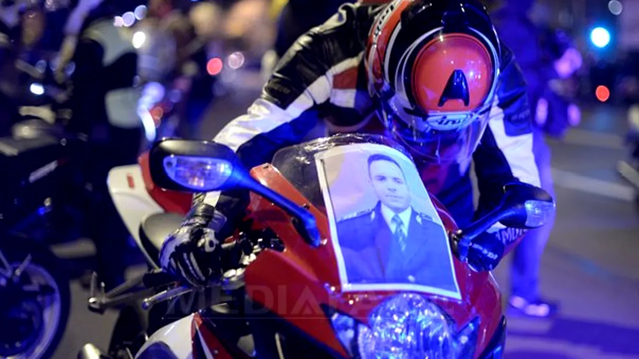 Aproximativ 300 de motociclişti au aprins lumânări la locul unde a murit poliţistul Bogdan Gigină - FOTO