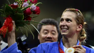 Sportivi români medaliaţi, dar şi oficialităţi, la Ziua României la JO