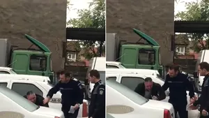 VIDEO. Poliţist cercetat într-un dosar de şantaj, filmat când plânge în curtea IPJ Arad