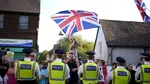 Guvernul britanic, pus sub presiune după izbucnirea protestelor migranților