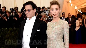 Johnny Depp şi Amber Heard divorţează după 15 luni de căsnicie