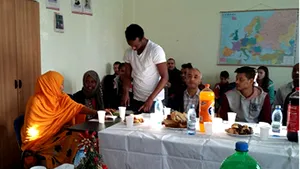 CRĂCIUN 2015: Refugiaţi din centre de azil au cântat colinde şi au mâncat preparate cu specific românesc - FOTO