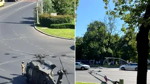Elicopterul militar american, care a aterizat de urgenţă într-o intersecţie din Bucureşti, a fost mutat. Stâlpi doborâţi, circulaţie reluată