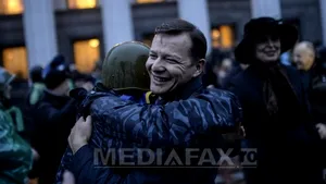 Bucurie în Kiev: Cum au reacţionat protestatarii la vestea că Parlamentul a votat demiterea lui Ianukovici - FOTO 
