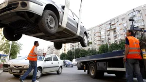 Proiectul privind ridicarea maşinilor parcate neregulamentar în Capitală, din nou în dezbaterea CGMB