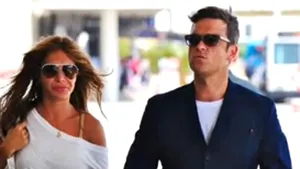 Robbie Williams pregăteşte un contract prenupţial pentru logodnica sa