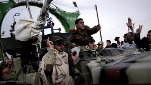 Forţele lui Muammar Kadhafi au comis un 