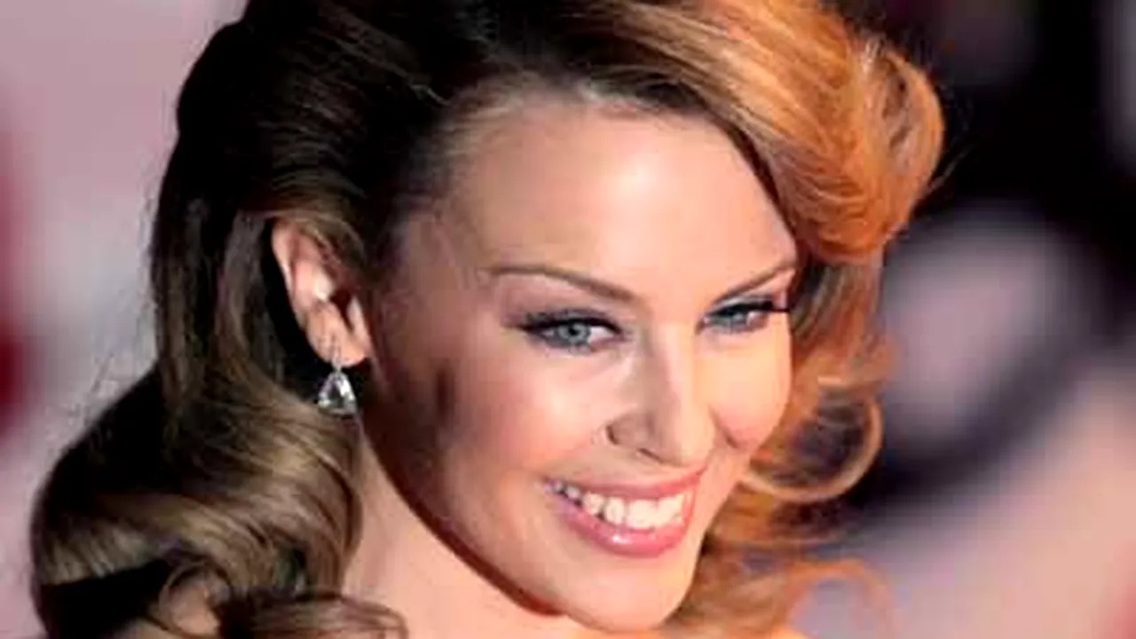 Kylie Minogue vrea să se mute în Spania