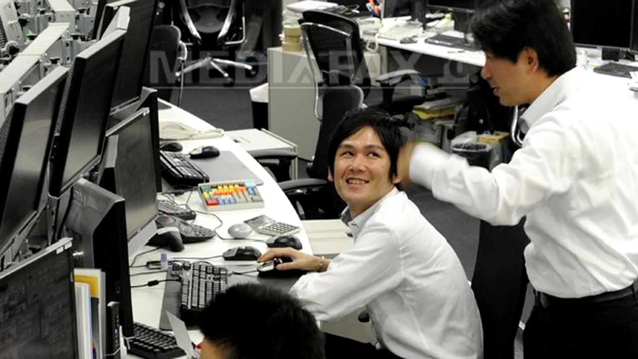 Bursele asiatice au scăzut, însă declinul a fost limitat de evoluţia pozitivă futures pe Wall Street