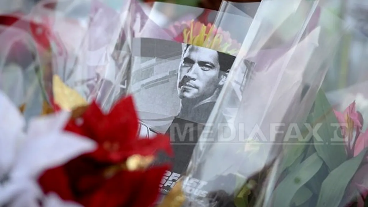 Câteva sute de persoane l-au omagiat pe actorul Paul Walker, vineri seară, în Bucureşti şi Timişoara