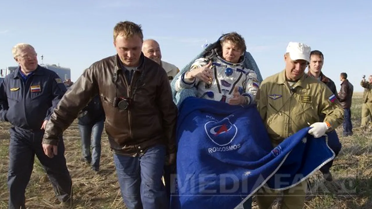 Trei astronauţi de pe Staţia Spaţială Internaţională au revenit pe Terra