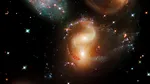 Telescopul James Webb descoperă o coliziune „extrem de rară” între cinci galaxii în universul timpuriu