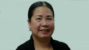 O americancă este reţinută în China de şase luni, fiind acuzată că 