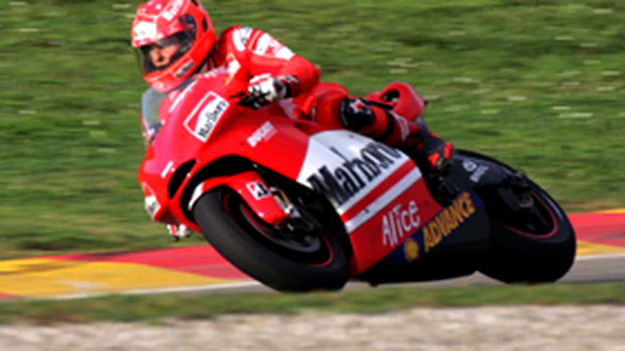 Michael Schumacher, pe podium la prima sa cursă oficială de motociclism