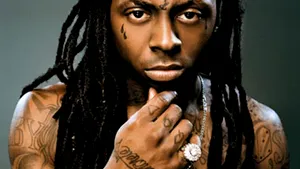 Lil Wayne, acuzat pentru deţinere ilegală de arme
