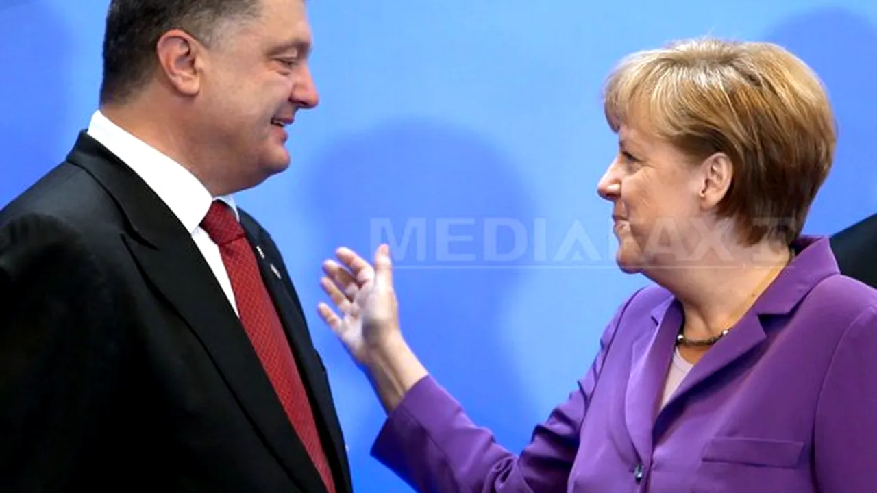 Merkel şi Poroşenko pledează pentru 