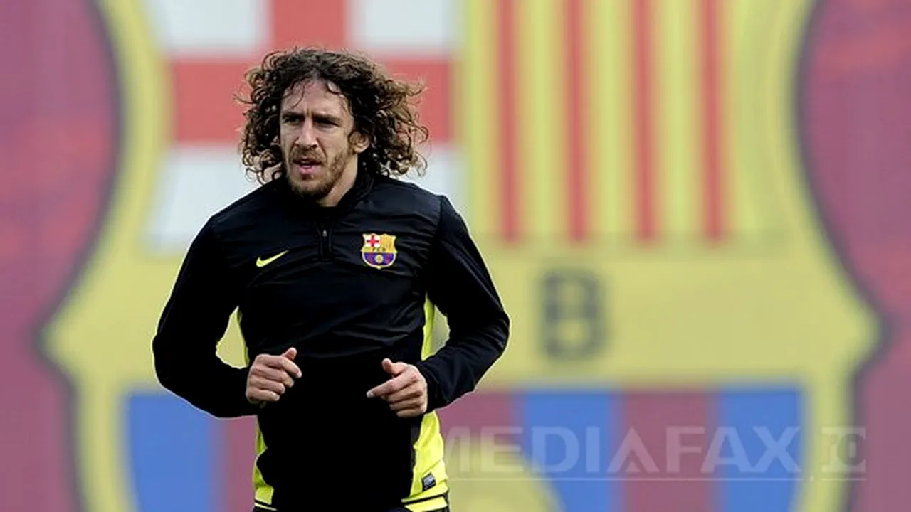 Carles Puyol va prezenta trofeul Cupei Mondiale la finala competiţiei din Brazilia