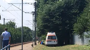  POZA femeii care s-a aruncat cu cei trei copii ai săi în faţa trenului. Aceasta era gravidă şi suferea de depresie. 