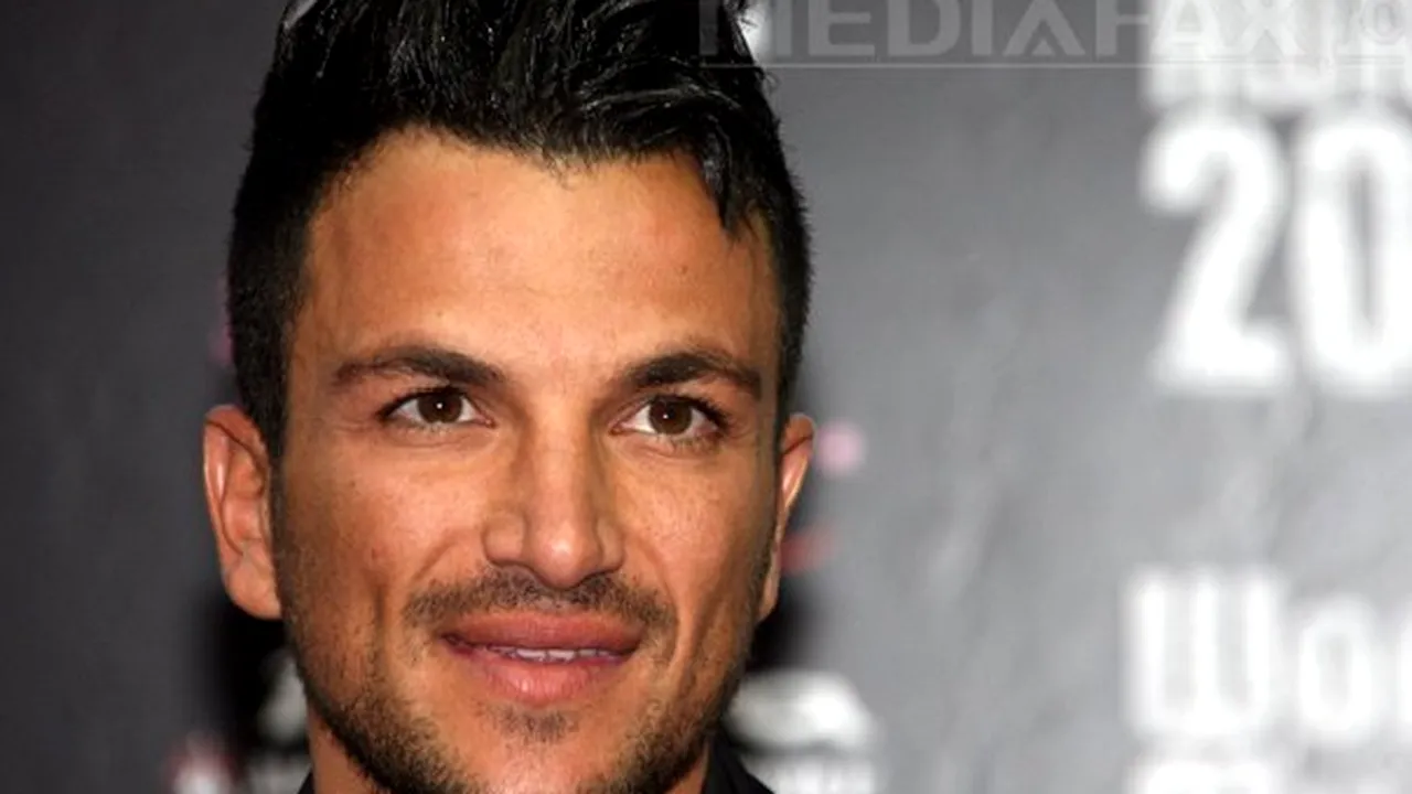 Cântăreţul Peter Andre se căsătoreşte