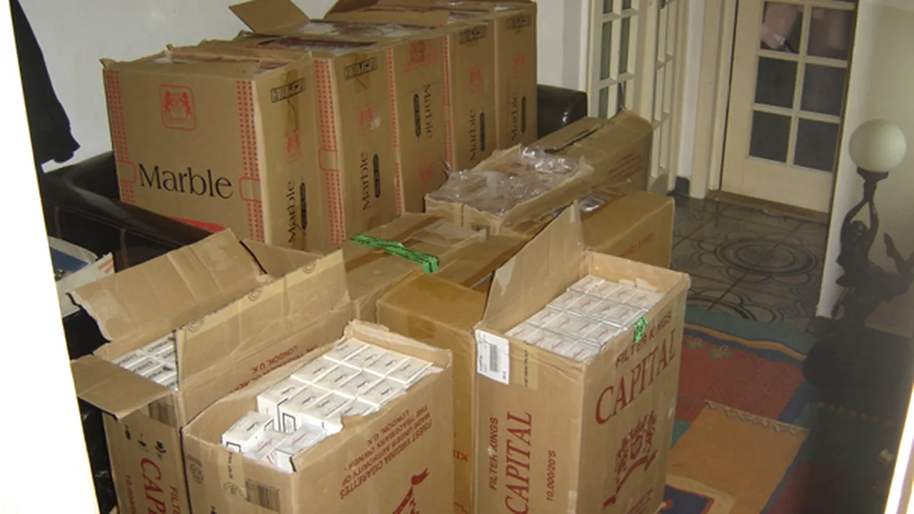 Peste 24.000 pachete de ţigări şi 110 kilograme de cafea, confiscate în urma unor percheziţii