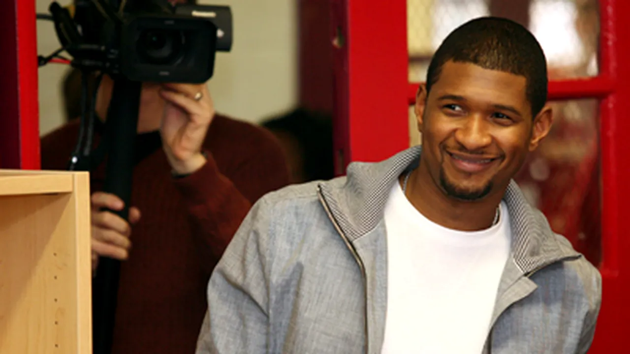 Usher divorţează, după o căsătorie care a durat doi ani