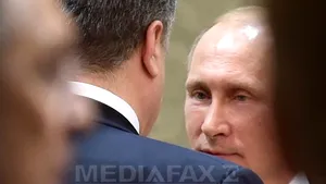 Ce nu s-a văzut la summitul de la Minsk: Schimburile de priviri dintre Putin, Poroşenko, Merkel şi Hollande la negocierile pentru acordul de pace - GALERIE FOTO