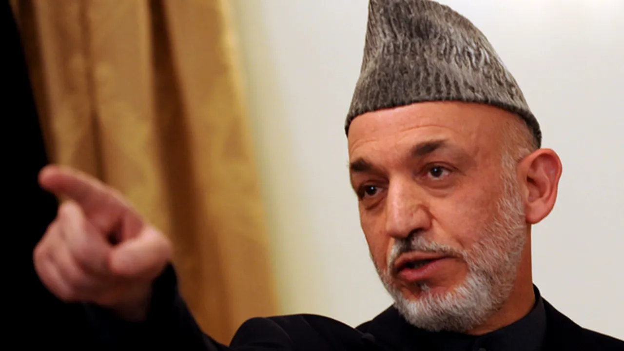 Hamid Karzai promite să 