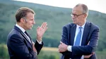 „Trebuie să ne recâștigăm capacitatea de a ne apăra libertatea”. Macron și Merz avertizează că democrațiile europene sunt în pericol