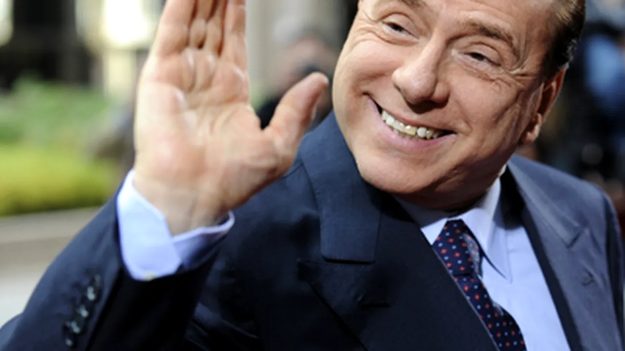 Berlusconi s-a enervat pe un reporter care a criticat comentariile sale despre Obama