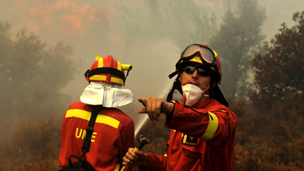 Opt persoane, între care şi doi români, arestate în legătură cu incendiile din Spania