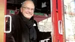 Un ministru britanic s-a predat poliției după ce a folosit telefonul în timp ce conducea un autobuz