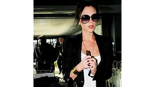 Victoria Beckham, sexy pe tocuri şi în pantaloni de piele, deşi este însărcinată - FOTO