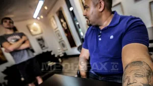 Tatuajele cu Nelson Mandela sunt tot mai răspândite în Africa de Sud la un an de la moartea acestuia - FOTO