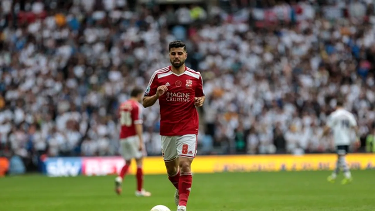 Un fotbalist irakian refugiat din ţara natală, la un pas să ajungă în Premier League