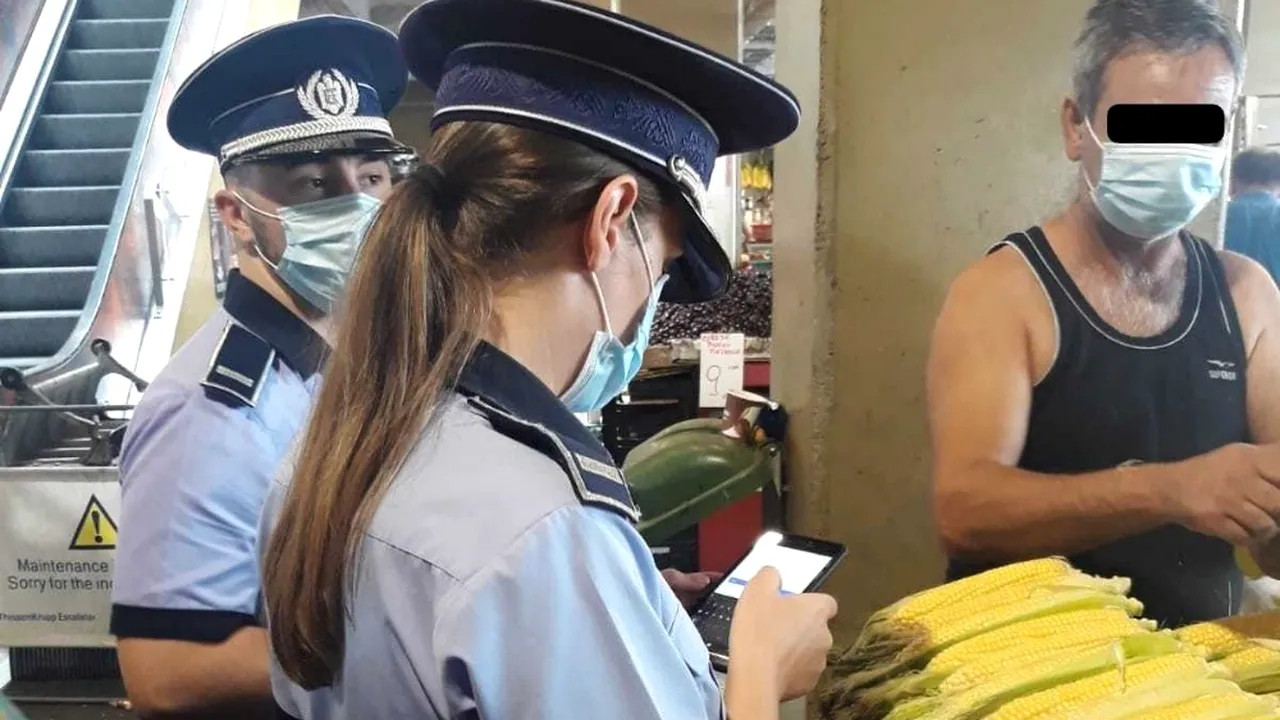 9 centre comerciale din Capitală, verificate de poliţişti: 66 de oameni, amendaţi pentru că nu aveau mască de protecţie FOTO