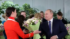 Putin, zâmbitor la întâlnirea cu personalul companiei aeriene Aeroflot