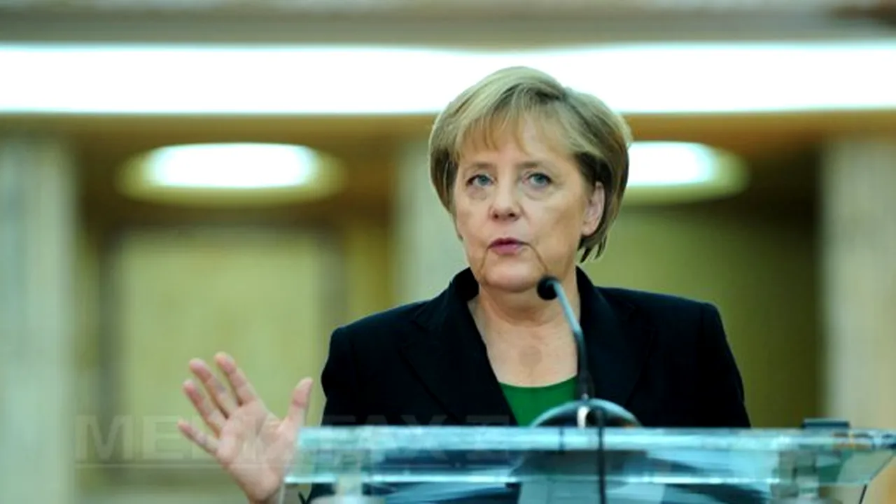 Angela Merkel îi cere lui Viktor Ianukovici să retragă legile care limitează dreptul la manifestaţii