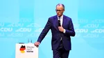 Contractele futures pe acţiunile germane şi euro au crescut ca urmare a victoriei lui Merz