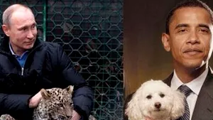 Rogozin publică o fotografie pe Twitter în care Putin ţine în braţe un leopard, iar Obama un căţel - FOTO