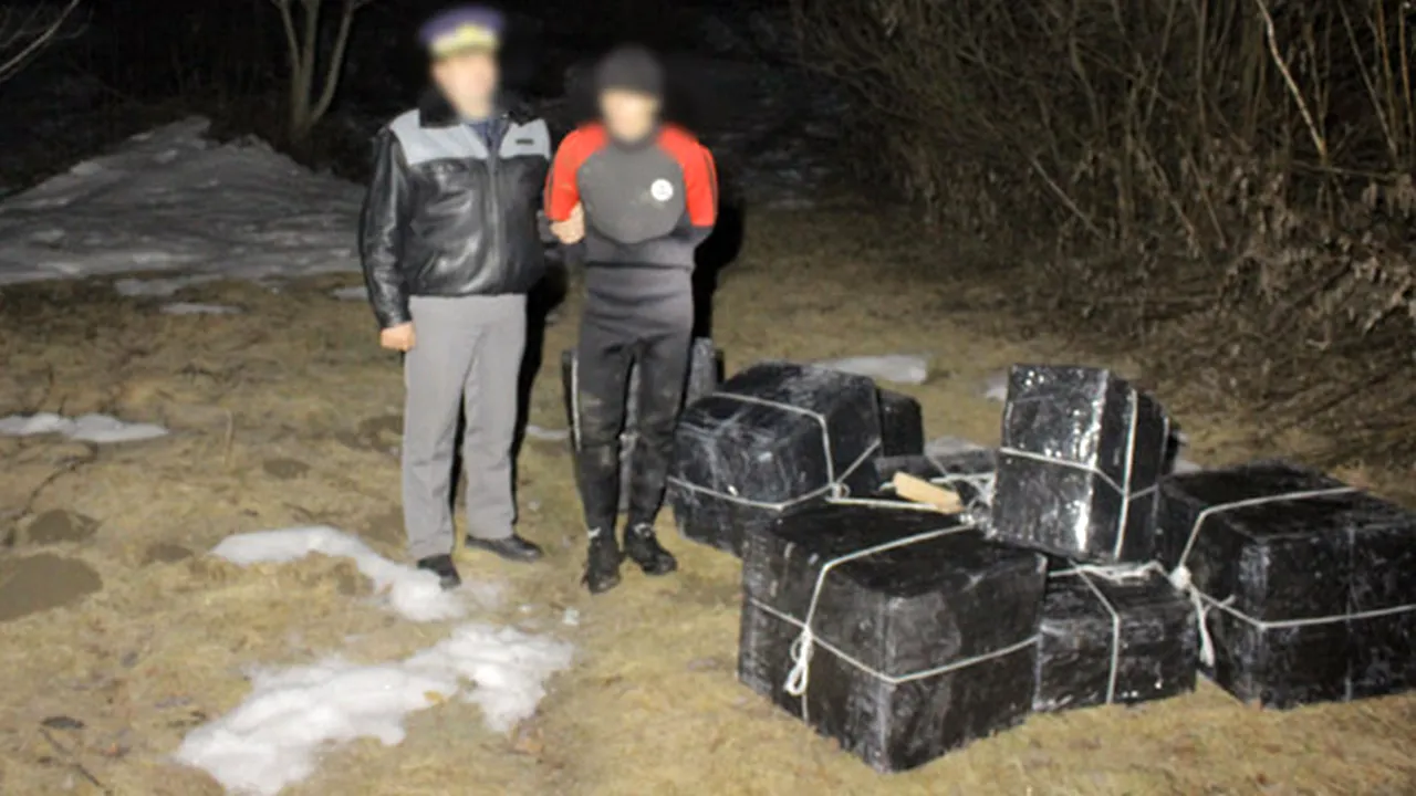 Un ucrainean, îmbrăcat în scafandru, prins când vroia să aducă pe Tisa ţigări de contrabandă