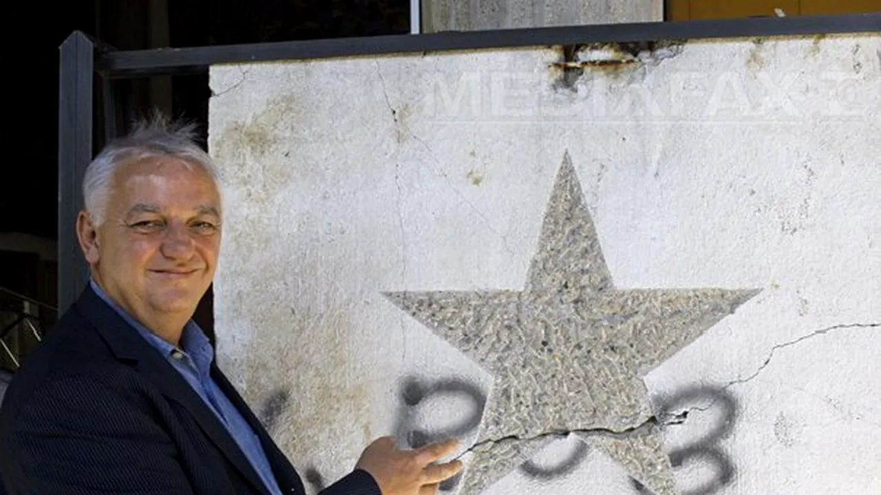 Bucăţi din Zidul Berlinului, redecorate de artişti, vândute la licitaţie - FOTO