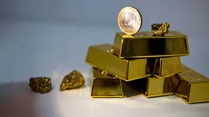 Aurul atinge maximul a şapte ani pe pieţele internaţionale. Investitorii caută securitate