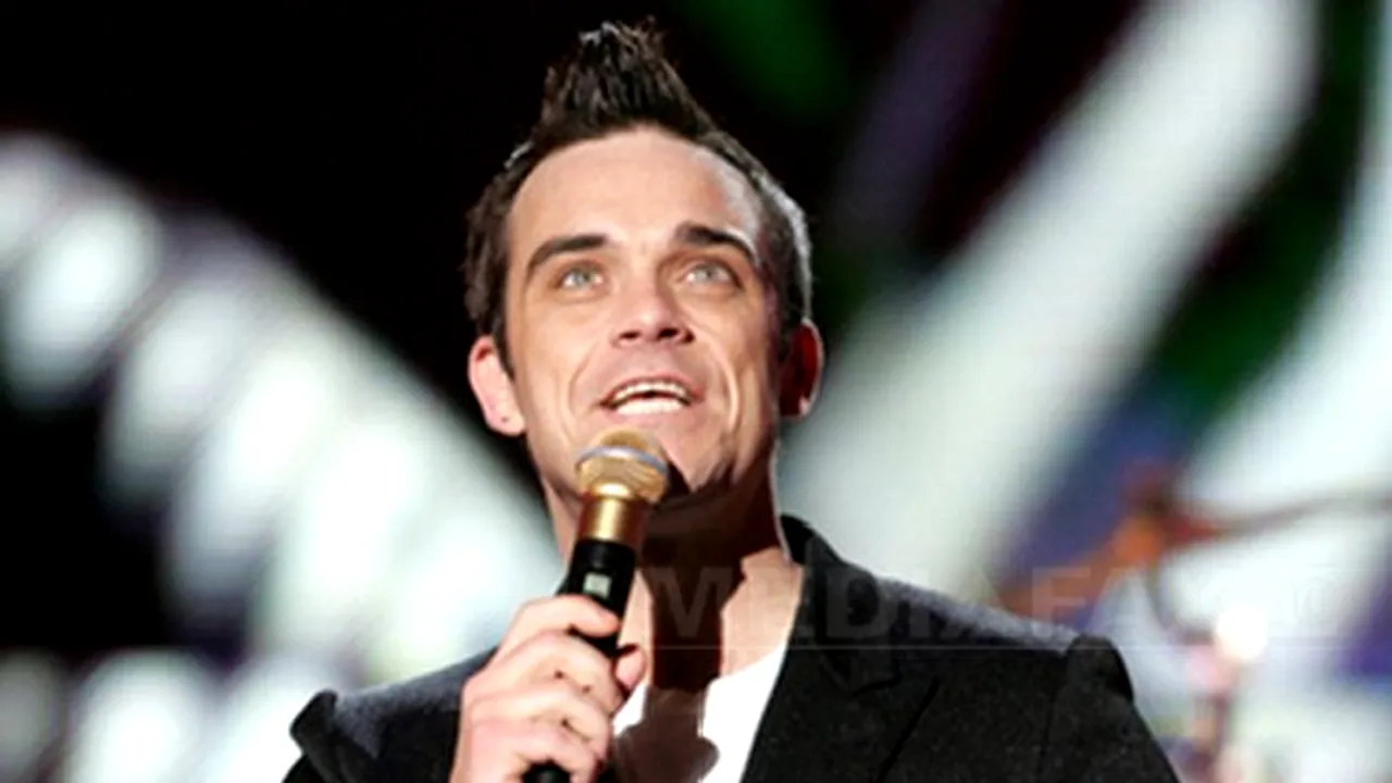 Robbie Williams şi soţia lui vor merge în luna de miere într-o staţiune exotică