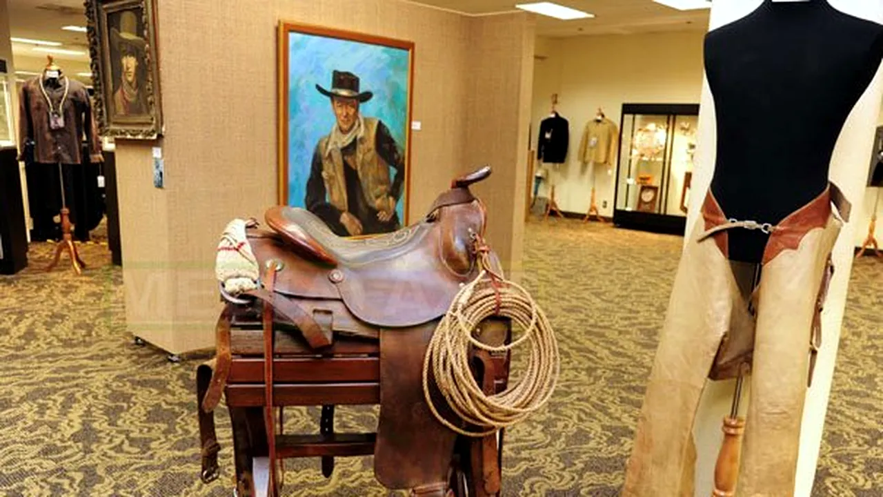Peste 700 de obiecte care i-au aparţinut lui John Wayne, scoase la licitaţie - FOTO